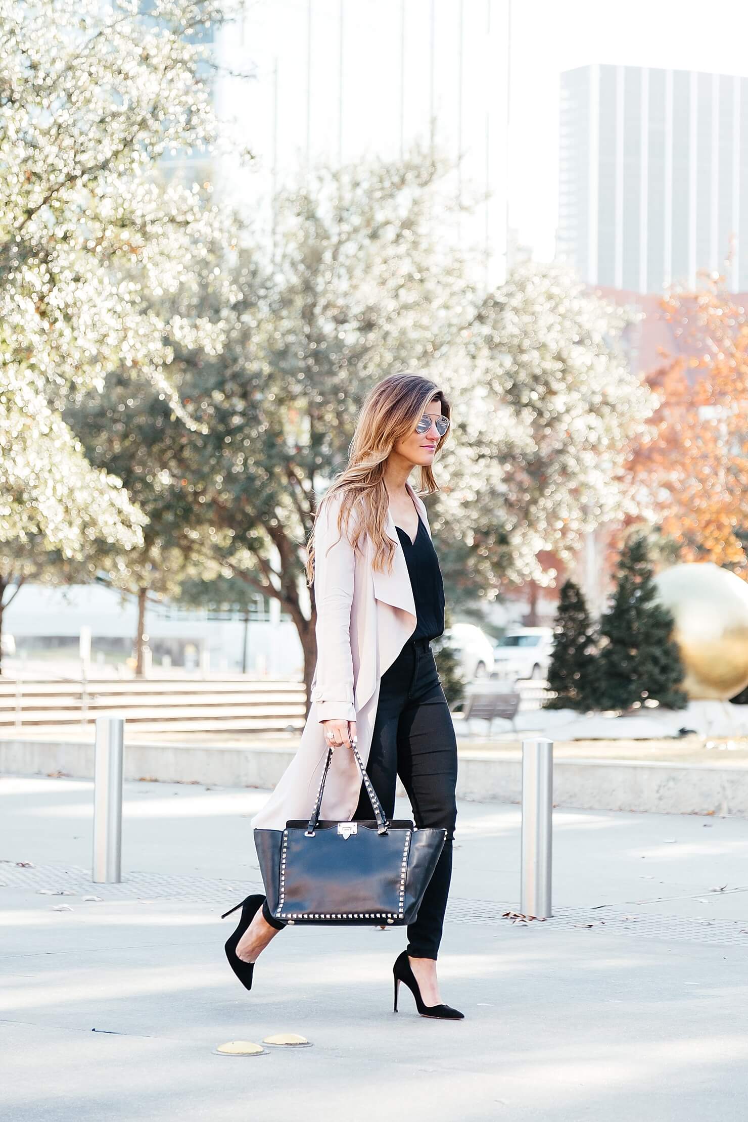 all black outfit, blush pink duster coat, pink trench coat, black on black going out look