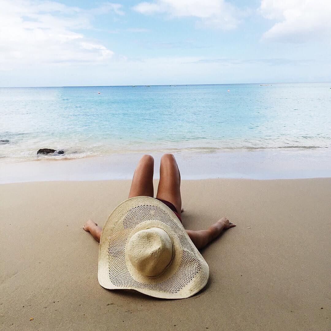 brighton the day featuring has 3 sunhat on the beach