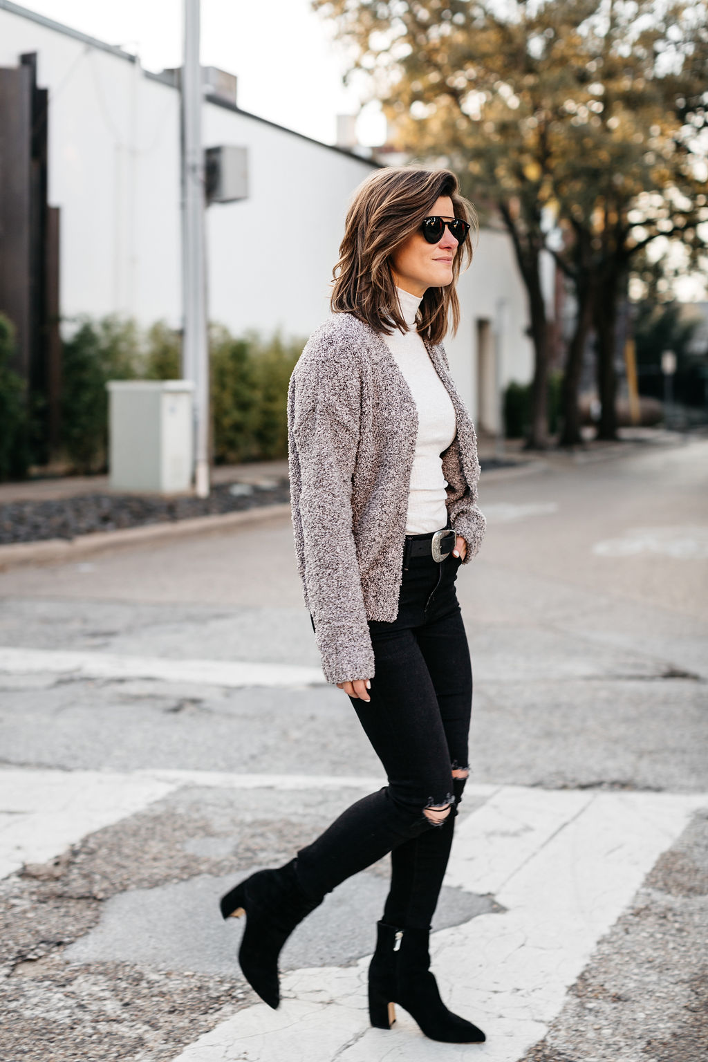 winter outfit black jeans cream turtleneck cropped cardigan western belt