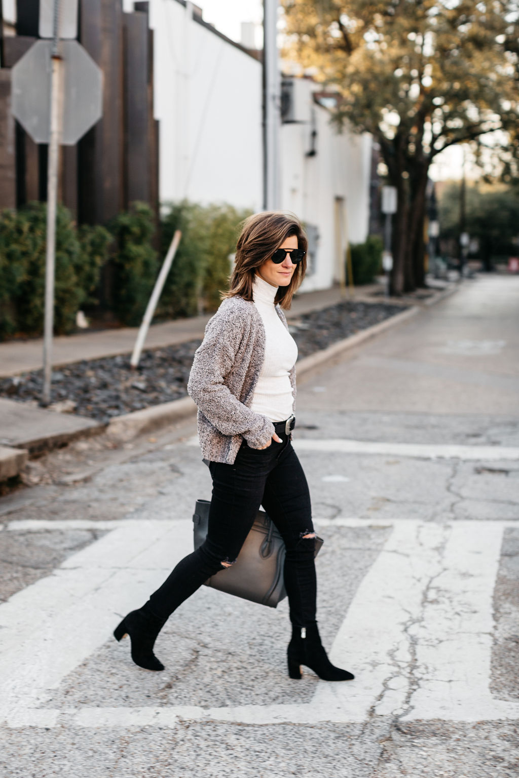 winter outfit black jeans cream turtleneck cropped cardigan western belt