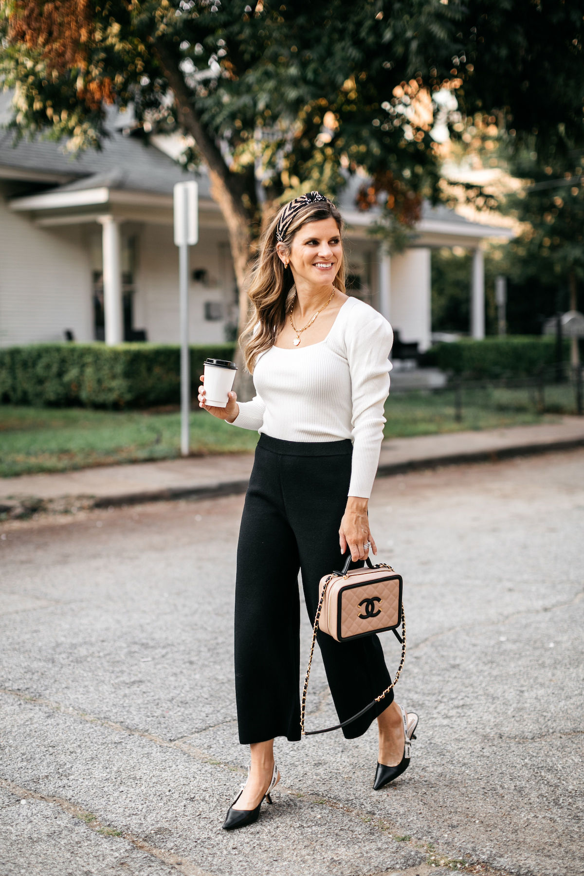work outfit brighton butler wearing jcrew black pants and cream sweater businss casual 1a